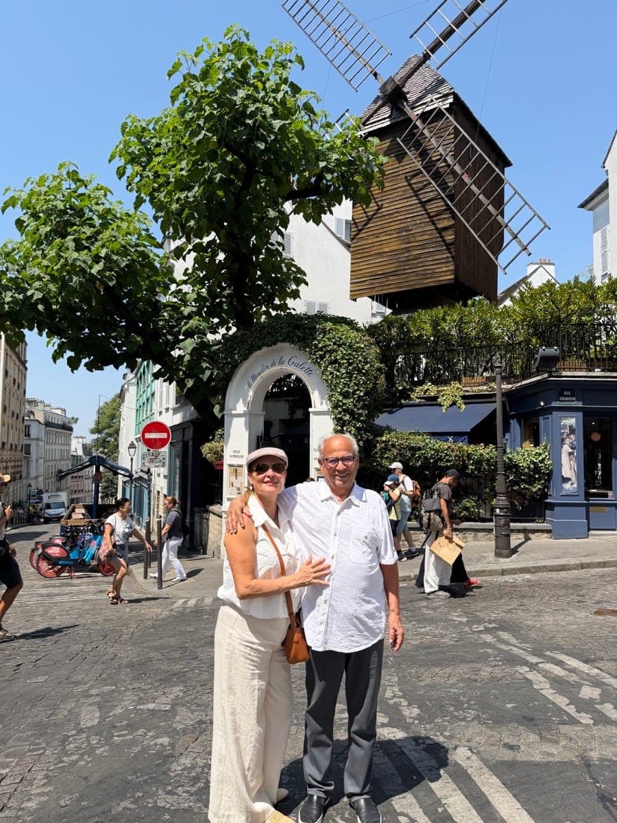 Couple at Le Moulin de la Galette in Montmartre, Paris